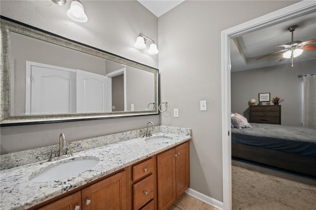 bathroom with vanity, tile patterned floors, and ceiling fan