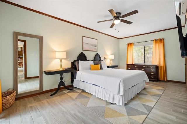 bedroom featuring crown molding, ceiling fan, baseboards, and light wood-style floors