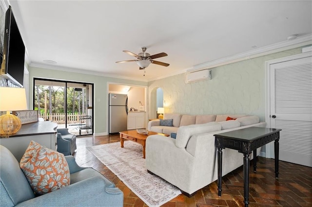 living room featuring arched walkways, a textured wall, ornamental molding, brick floor, and an AC wall unit