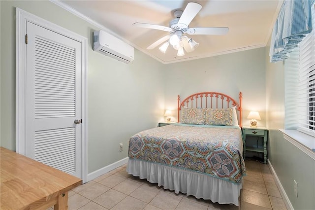 bedroom with baseboards, a wall unit AC, tile patterned flooring, and crown molding