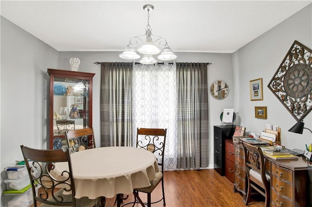 10628 Johnson Rd S, Mobile, AL 36695 - dining room with a chandelier, dark wood-type flooring, and an office area