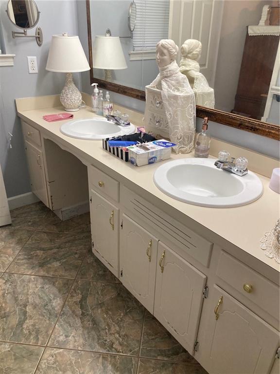 bathroom featuring vanity