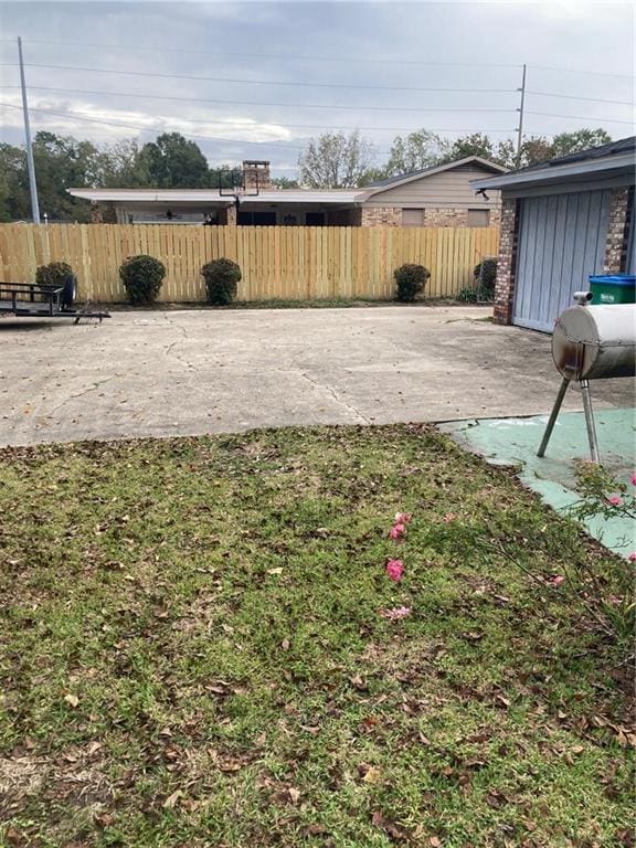 724 Mae St, Saraland, AL 36571 - view of yard featuring a patio