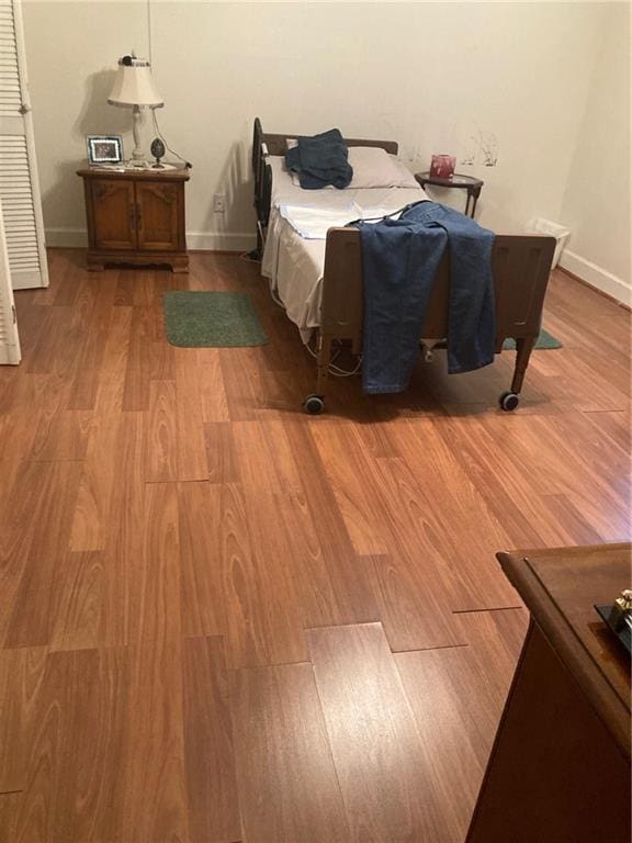 bedroom featuring light hardwood / wood-style flooring