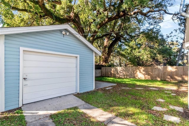 garage with a yard