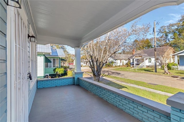 balcony featuring a porch