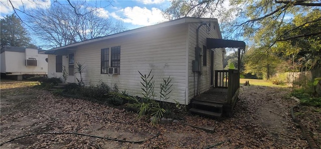 view of property exterior with cooling unit