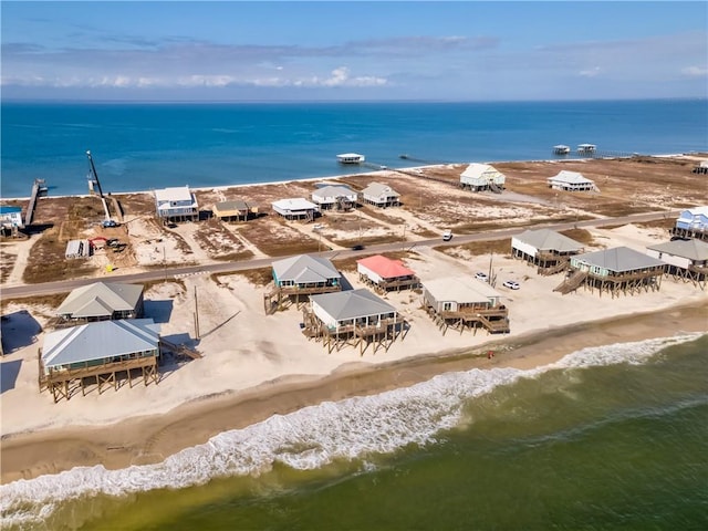 aerial view with a beach view and a water view