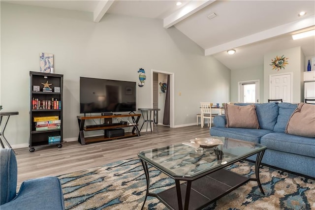 living room with high vaulted ceiling, baseboards, beam ceiling, and wood finished floors