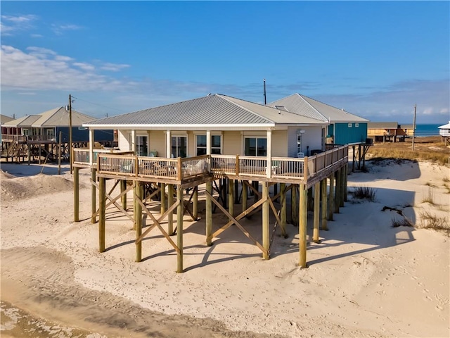 rear view of house with a water view