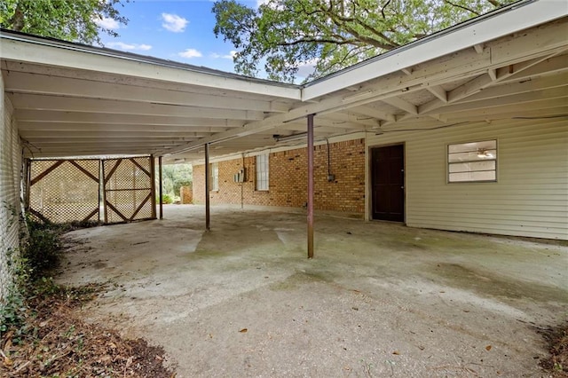 view of parking featuring a carport