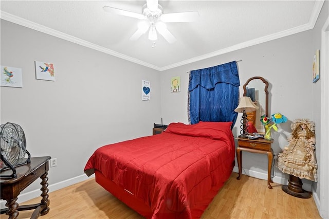 bedroom with ornamental molding, light hardwood / wood-style floors, and ceiling fan