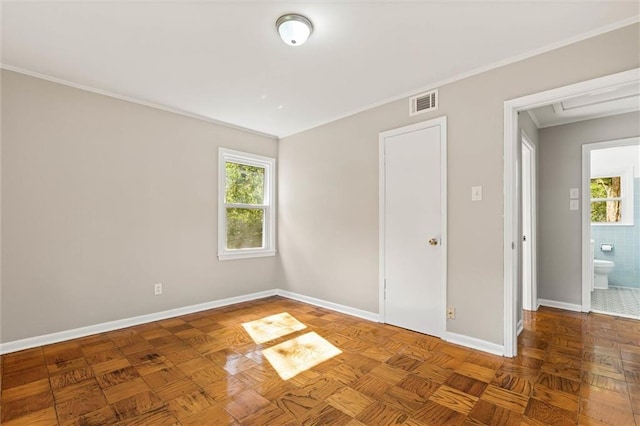 4061 Sallie Ct, Mobile, AL 36609 - unfurnished bedroom featuring multiple windows and ornamental molding