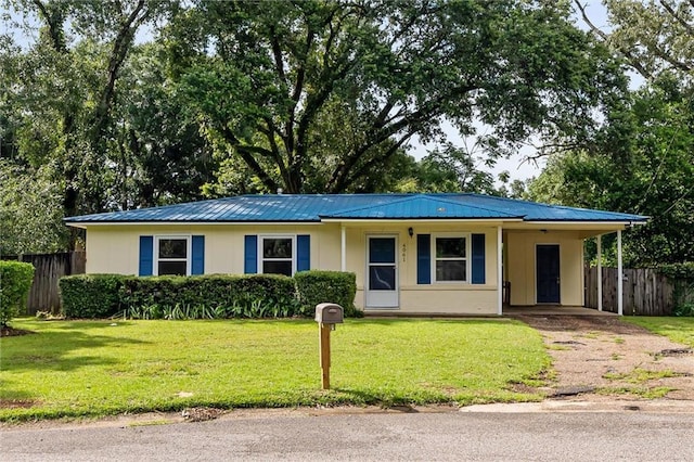 4061 Sallie Ct, Mobile, AL 36609 - view of front facade with asphalt driveway, an attached carport, and a metal roof