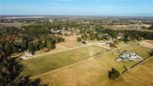 birds eye view of property featuring a rural view