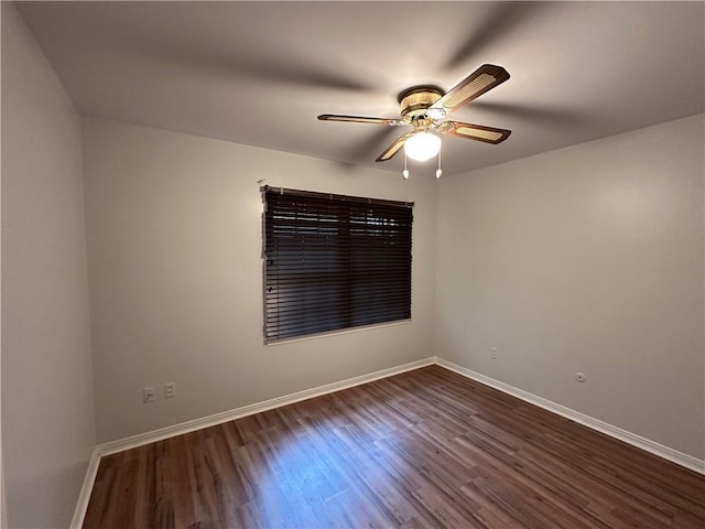5859 Chalet Dr N, Mobile, AL 36608 - empty room with ceiling fan and dark wood-type flooring