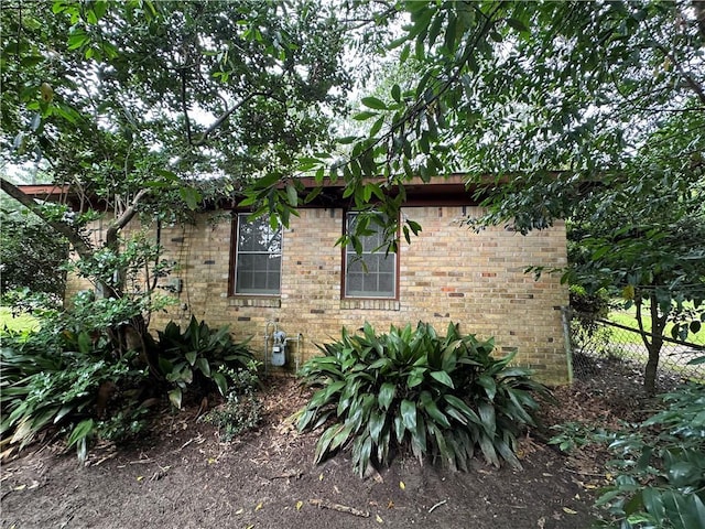5859 Chalet Dr N, Mobile, AL 36608 - view of side of property featuring brick siding
