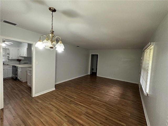 5859 Chalet Dr N, Mobile, AL 36608 - unfurnished living room with dark wood-style floors, a chandelier, and ceiling fan