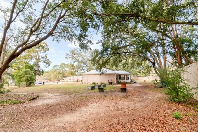 view of yard featuring fence