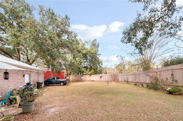 view of yard featuring a fenced backyard