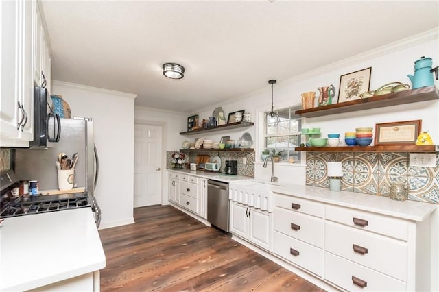 kitchen featuring crown molding, open shelves, white cabinetry, a sink, and dishwasher