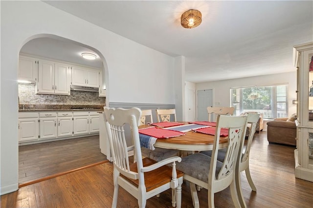 dining room featuring dark hardwood / wood-style flooring