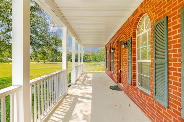 view of patio featuring a porch