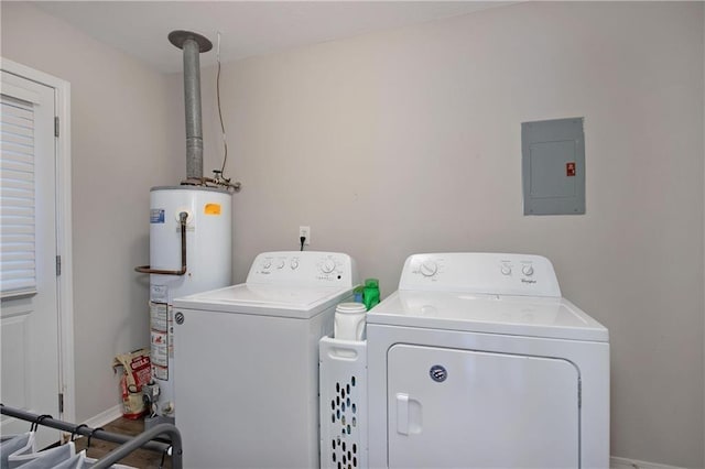 laundry room with electric panel, separate washer and dryer, and gas water heater