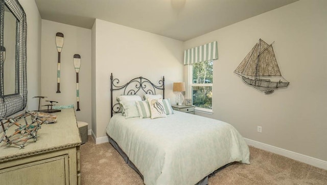 10580 Relic Rd S, Mobile, AL 36608 - bedroom featuring light carpet and arched walkways