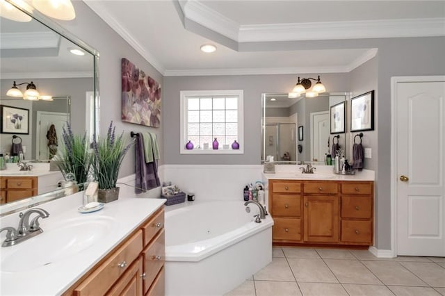 9633 White Castle Rd, Mobile, AL 36695 - full bathroom with tile patterned flooring, a stall shower, two vanities, a garden tub, and crown molding