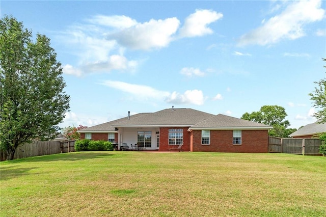 9633 White Castle Rd, Mobile, AL 36695 - back of house with a fenced backyard and brick siding