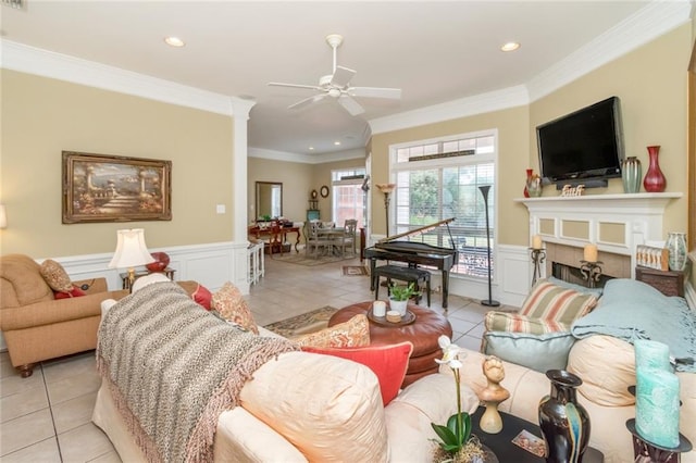 9633 White Castle Rd, Mobile, AL 36695 - living room featuring light tile patterned floors, ceiling fan, wainscoting, recessed lighting, and crown molding