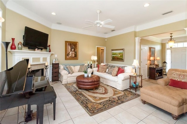 9633 White Castle Rd, Mobile, AL 36695 - living area featuring ornamental molding, decorative columns, light tile patterned floors, ceiling fan, and recessed lighting