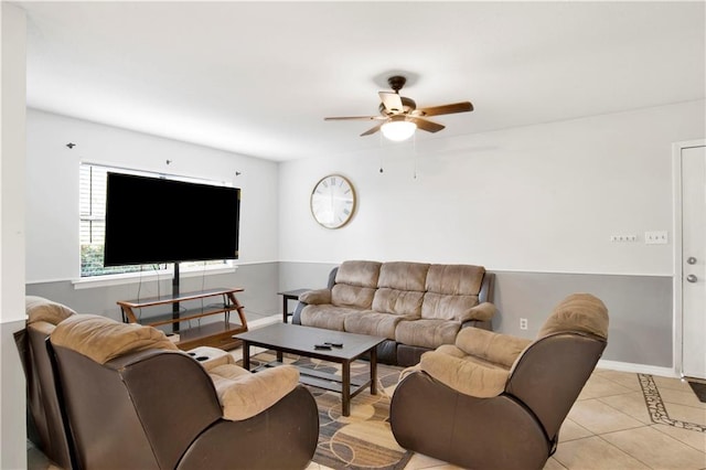 tiled living room featuring ceiling fan