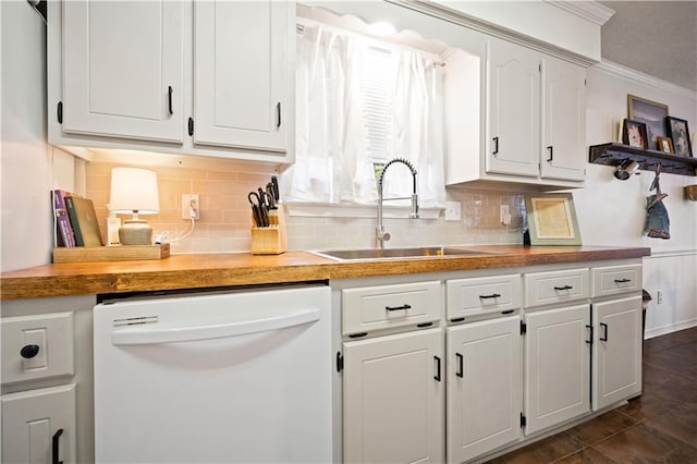 kitchen with ornamental molding, a sink, backsplash, white cabinetry, and dishwasher