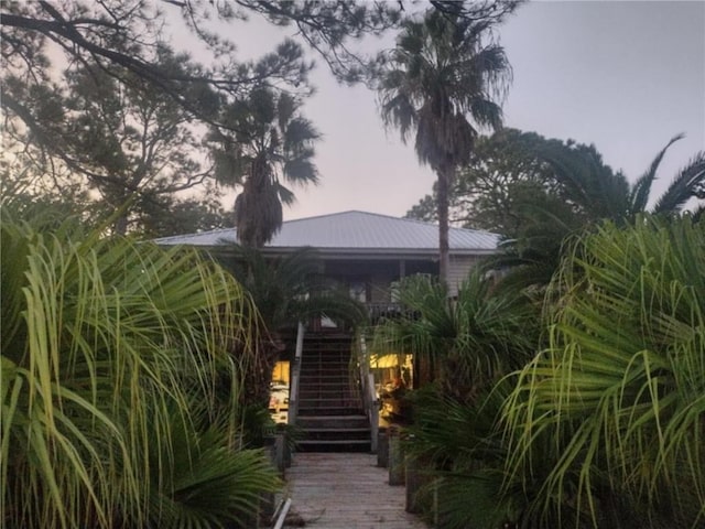 829 Desoto Dr, Dauphin Island, AL 36528 - view of front of property featuring stairs and metal roof