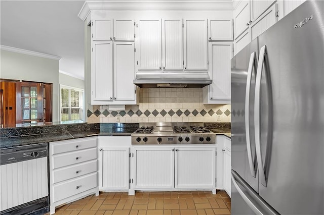 kitchen with tasteful backsplash, white cabinetry, and stainless steel appliances