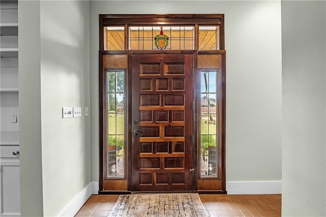 entryway with wood-type flooring