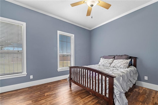 bedroom with ceiling fan, hardwood / wood-style floors, and crown molding