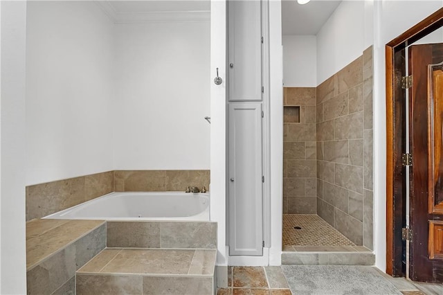 bathroom with tile patterned flooring and independent shower and bath