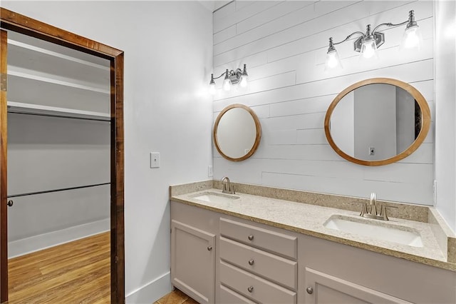 bathroom with vanity and hardwood / wood-style floors