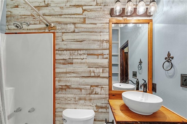 bathroom with toilet and vanity