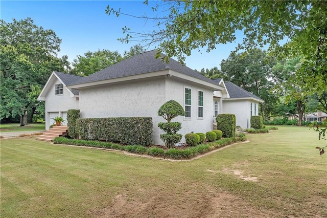 view of property exterior with a lawn