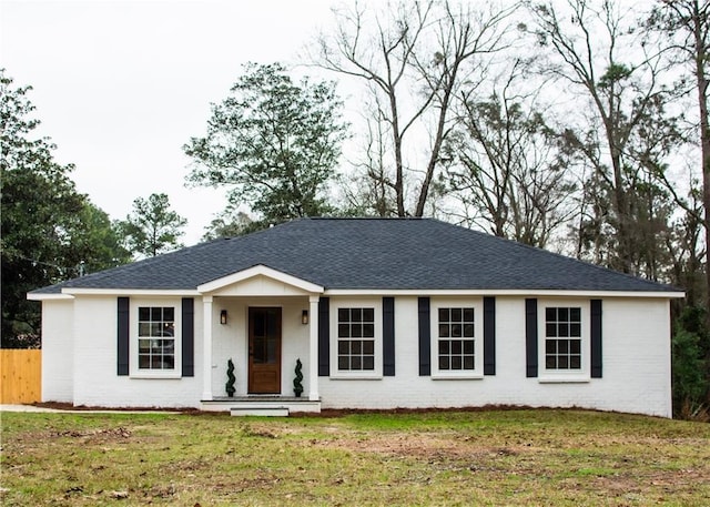 ranch-style house with a front yard