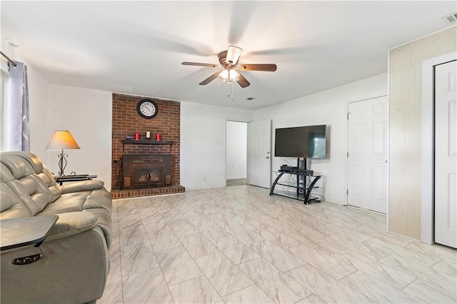 living room featuring a brick fireplace, visible vents, ceiling fan, and marble finish floor