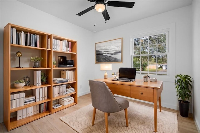 office area featuring light wood-type flooring and ceiling fan