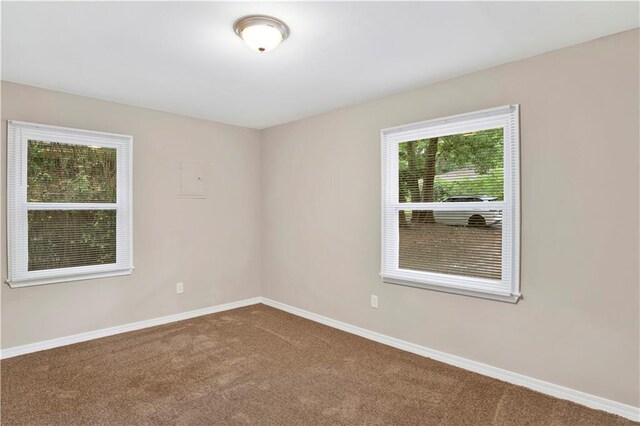 113 Hilltop Dr E, Mobile, AL 36608 - carpeted empty room with baseboards