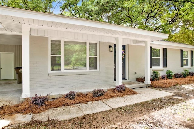 113 Hilltop Dr E, Mobile, AL 36608 - view of front of home with brick siding and a porch