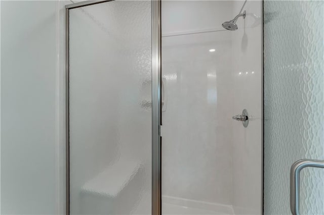 full bathroom with a shower stall
