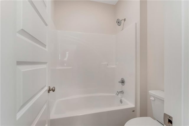 full bathroom featuring toilet and washtub / shower combination
